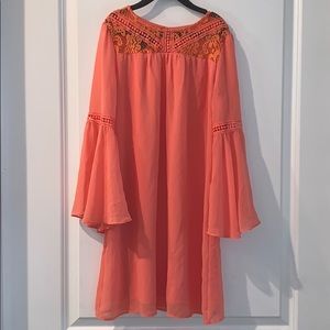In girl light orange dress